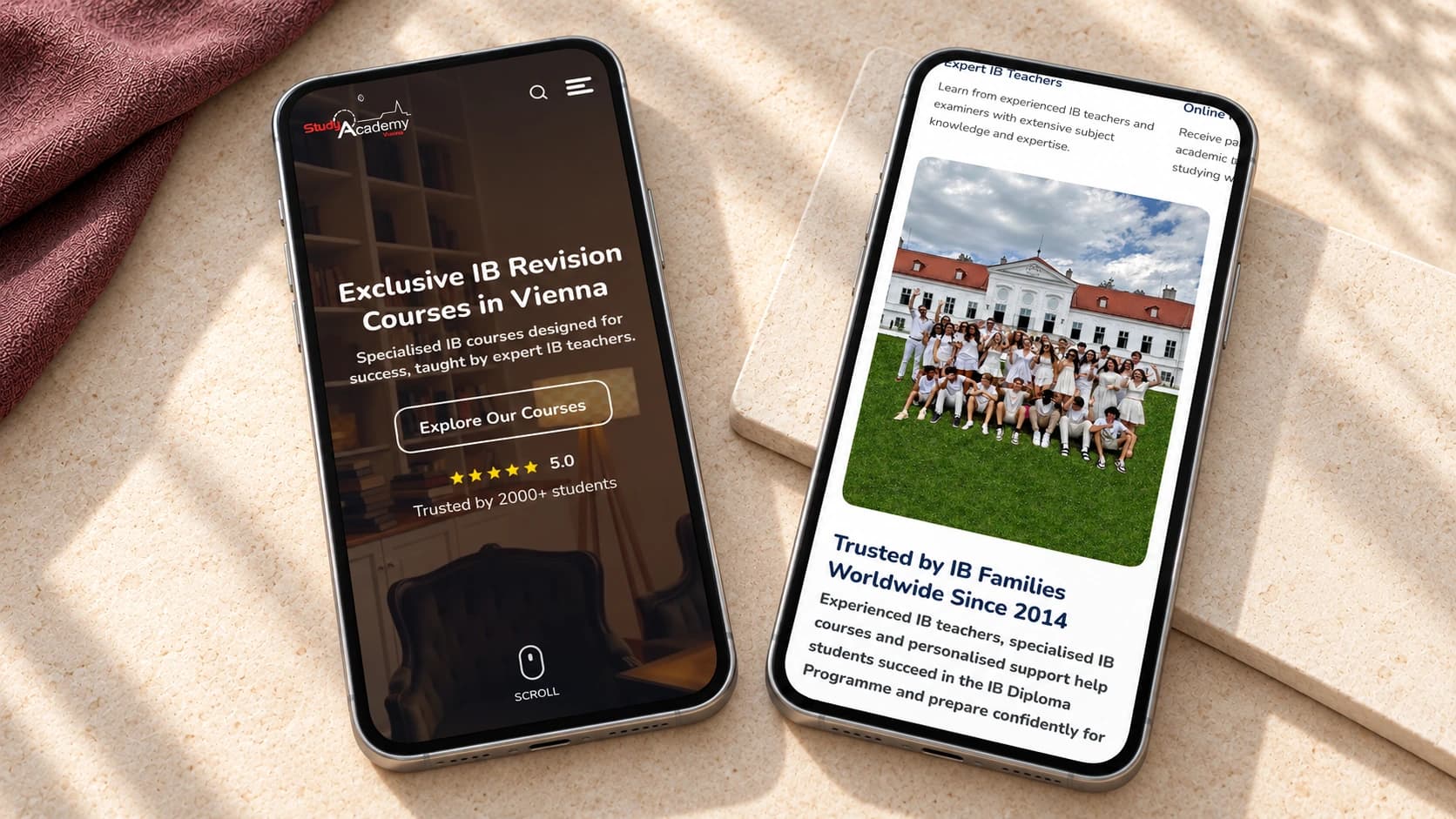 Study Academy Vienna mobile website displayed on two smartphones on a stone desk
